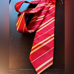 Red and gold 100% silk tie.